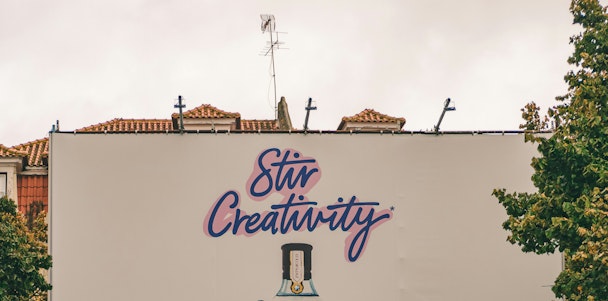 The message on the top half of a billboard reads 'sitr creativity'