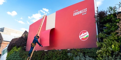 A giant Babybel billboard