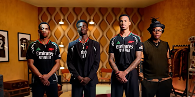 Arsenal players wearing 24/25 kit in an African interior design inspired room