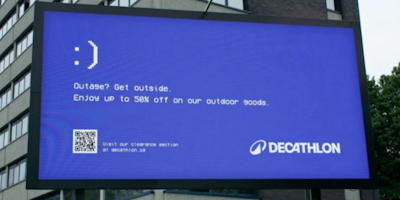 Billboard from Decathlon with a blue screen mimicking the error sign of Microsoft