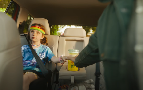 little girl in a car