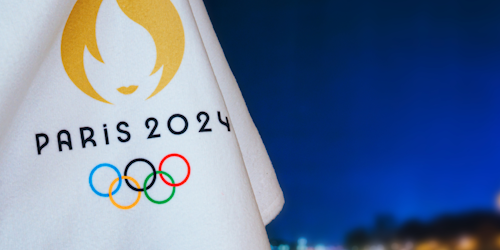 Paris 2024 logo on white flag