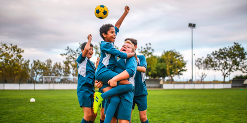 children playing soccer